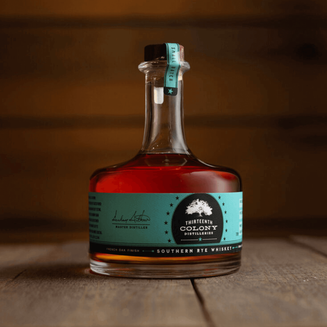 Thirteenth Colony French Oak Southern Rye Whiskey 750mL bottle showcasing rich amber color and brand label.