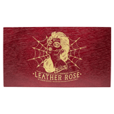 Wooden box of Deadwood Leather Rose Torpedo cigars with artistic design, showcasing bold and spicy flavor from Nicaragua.